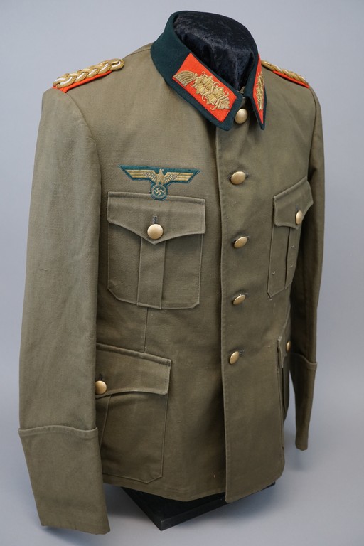 A picture containing uniform, clothing, luggage, bag

Description automatically generated