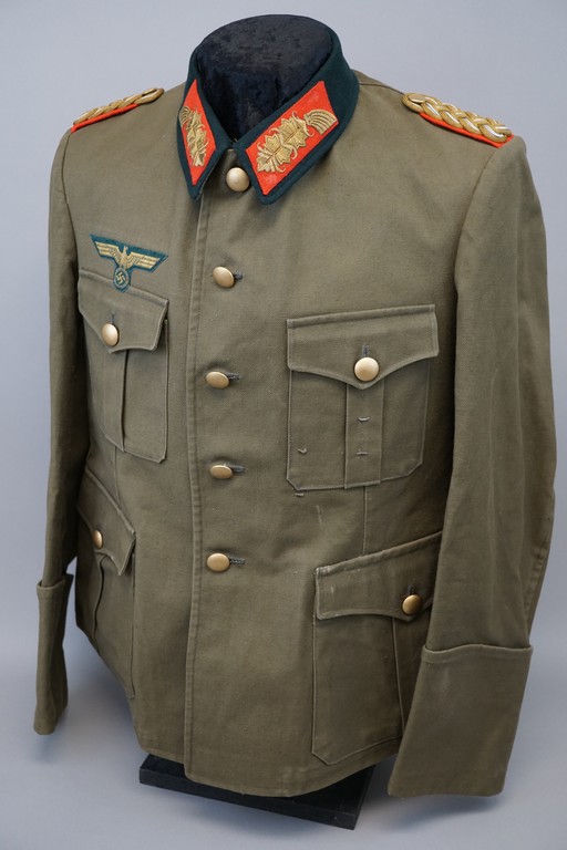 A picture containing suit, luggage, clothing, uniform

Description automatically generated