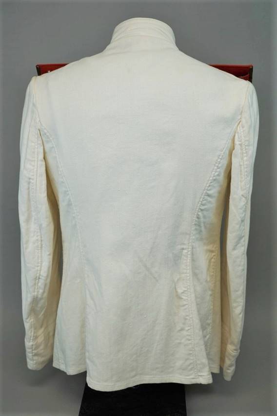 A white shirt on a mannequin

Description automatically generated with medium confidence