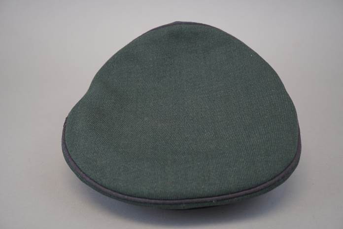 A close-up of a hat

Description automatically generated with medium confidence