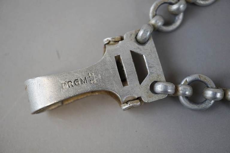 A close-up of a key chain

Description automatically generated with medium confidence