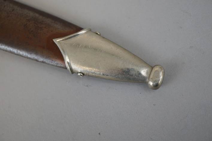 A close-up of a knife

Description automatically generated with low confidence
