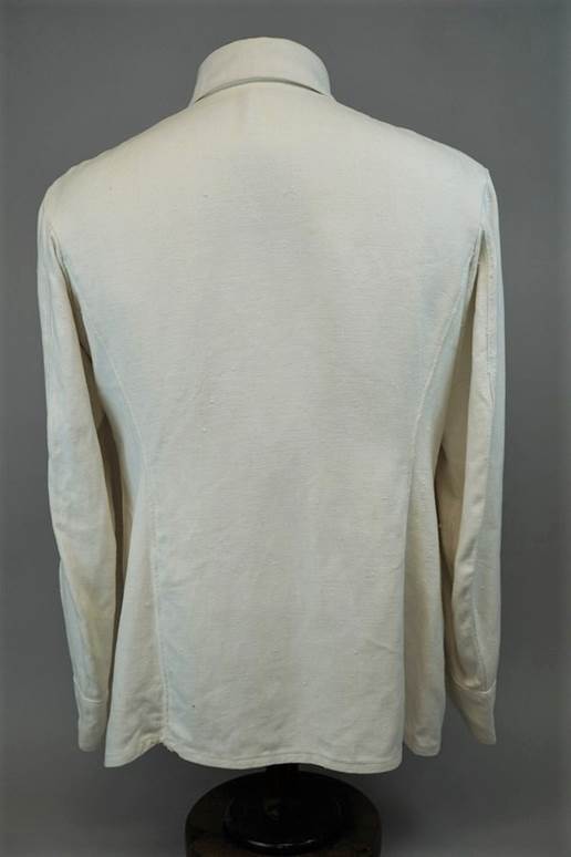 A white shirt on a mannequin

Description automatically generated with medium confidence