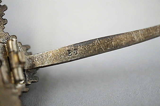 A close up of a sword

Description automatically generated with medium confidence