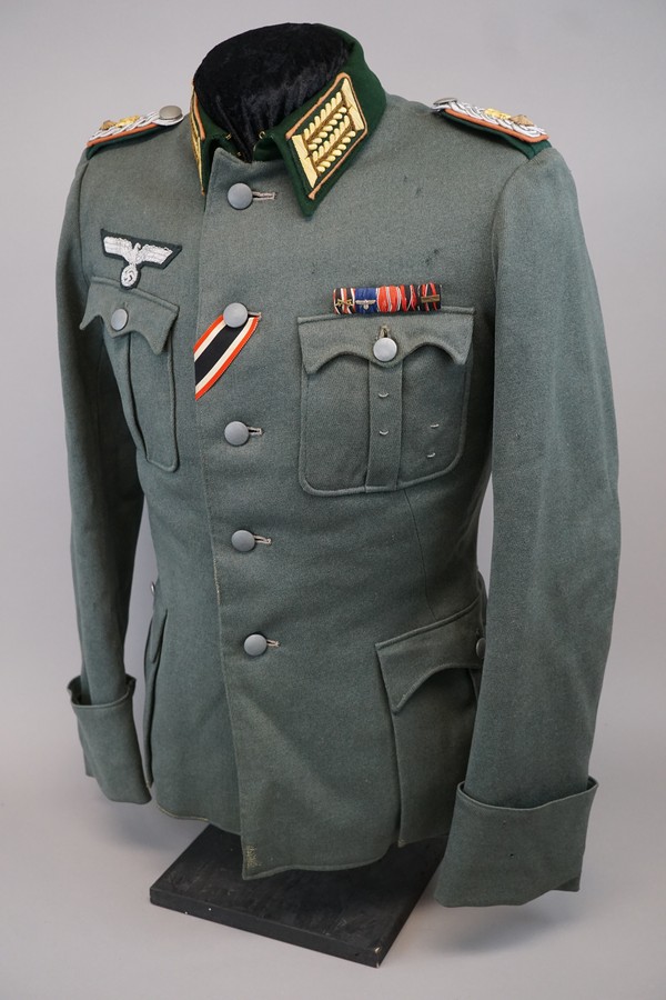 A military uniform on display

Description automatically generated with low confidence