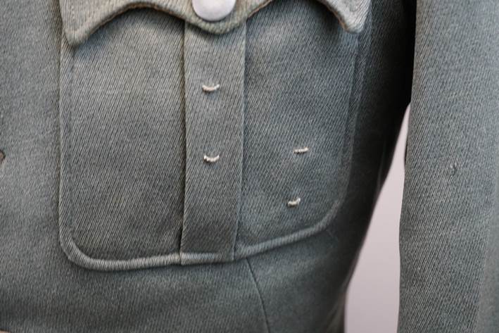 A close up of a person's jacket

Description automatically generated with low confidence