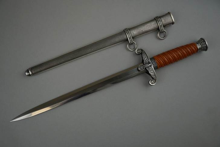 A sword with a long handle

Description automatically generated with low confidence