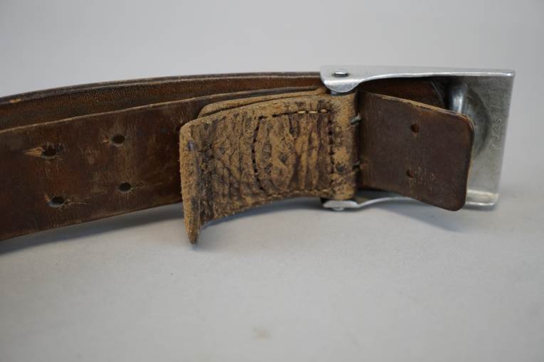 A picture containing indoor, belt, accessory

Description automatically generated
