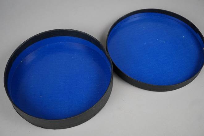 A picture containing blue, accessory, enamel, case

Description automatically generated