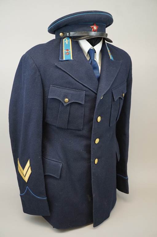A blue military uniform

Description automatically generated with low confidence