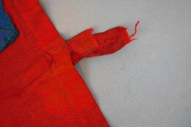 A red sock on a white surface

Description automatically generated with low confidence