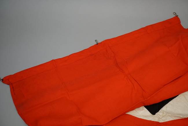 A picture containing indoor, orange, bed, red

Description automatically generated