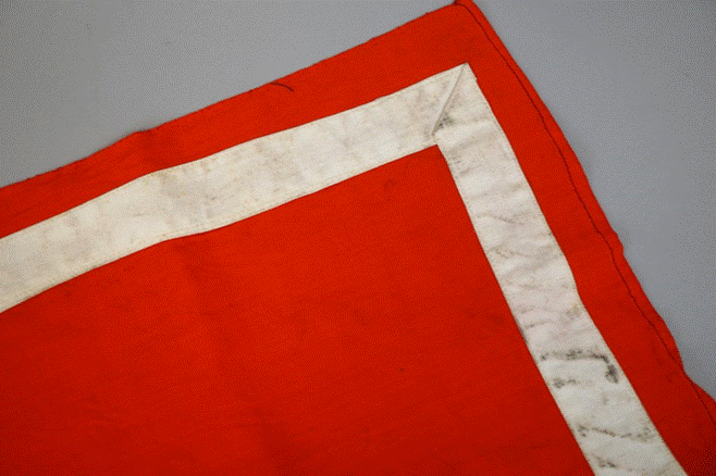 A red and white flag

Description automatically generated with low confidence