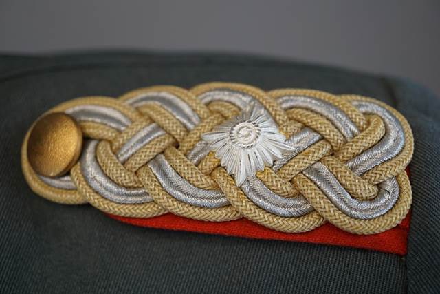 A close-up of a military uniform

Description automatically generated with low confidence