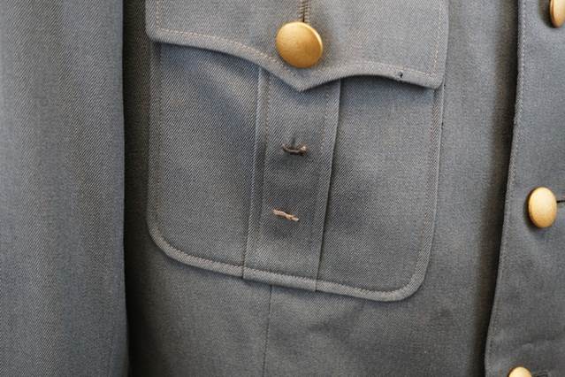 Close-up of a military uniform pocket

Description automatically generated with medium confidence