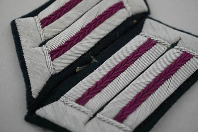 Close-up of a white and purple fabric

Description automatically generated