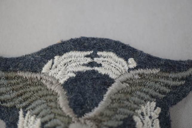 A close-up of a blue and white fabric

Description automatically generated