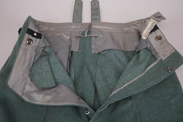 A close-up of a green jacket

Description automatically generated