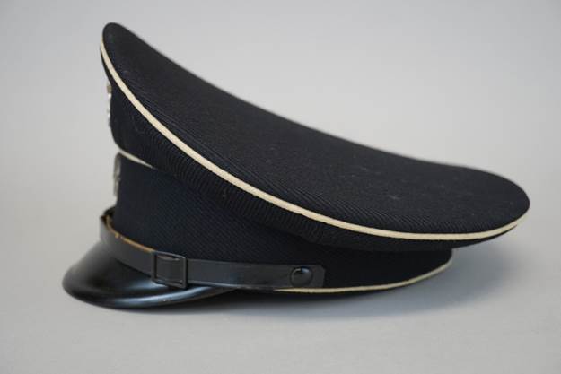 A black hat with white trim

Description automatically generated