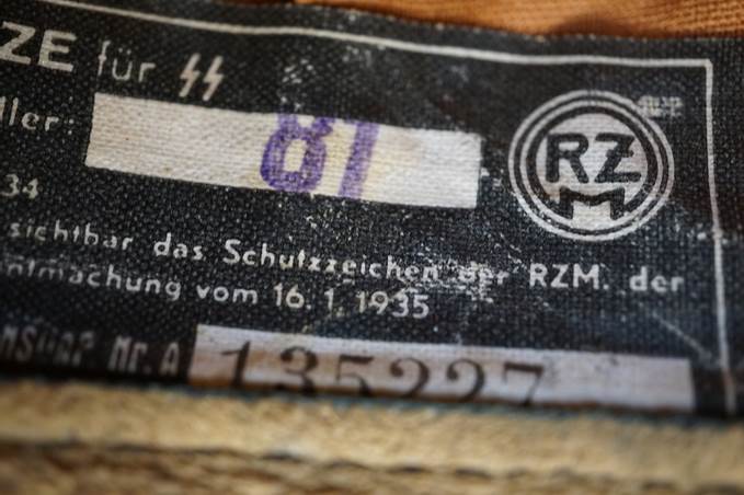 Close-up of a label on a fabric

Description automatically generated
