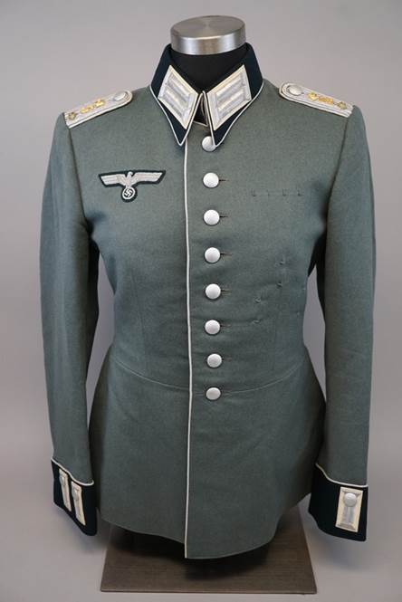 A military uniform on a mannequin

Description automatically generated