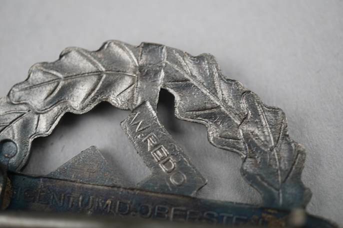 Close-up of a metal leaf

Description automatically generated