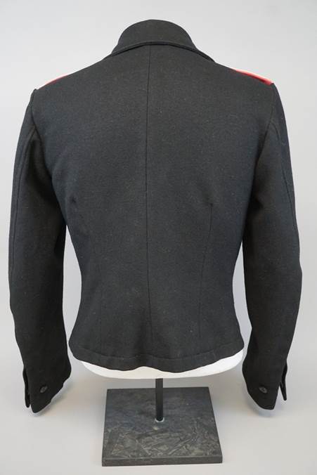 A black jacket with red trim

Description automatically generated