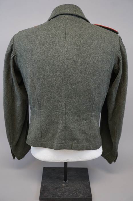 A back view of a jacket

Description automatically generated