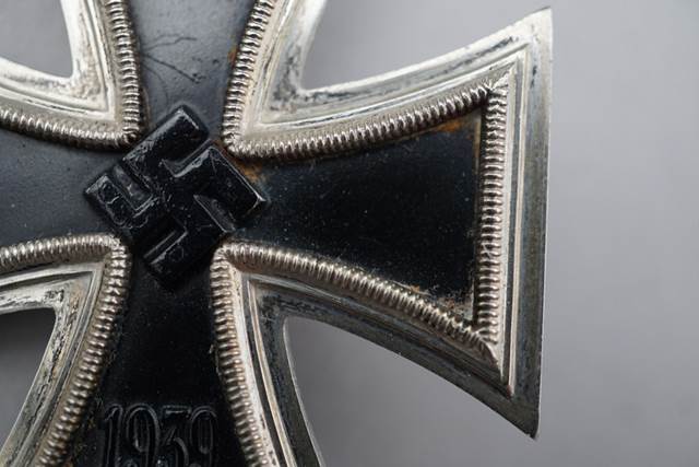 Close-up of a german cross

Description automatically generated