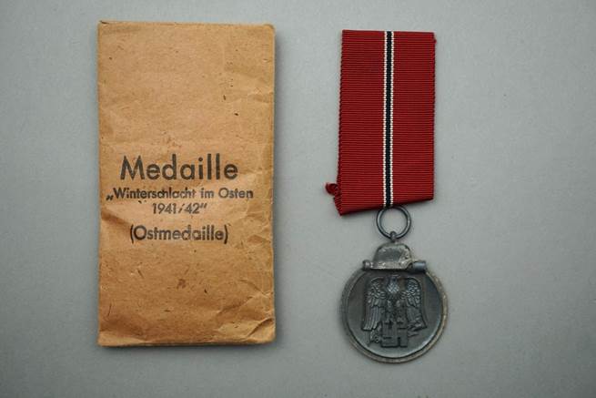 A medal and a package

Description automatically generated