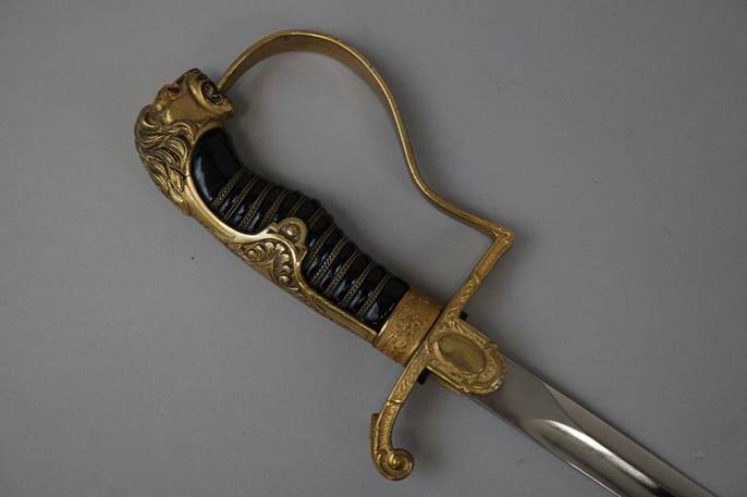 A sword with a handle

Description automatically generated