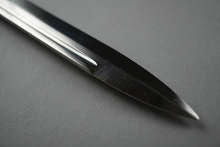 Close-up of a sharp blade

Description automatically generated