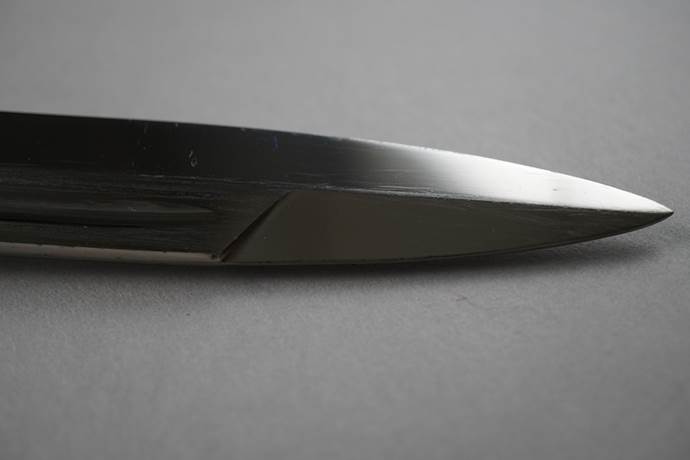 Close-up of a sharp knife

Description automatically generated