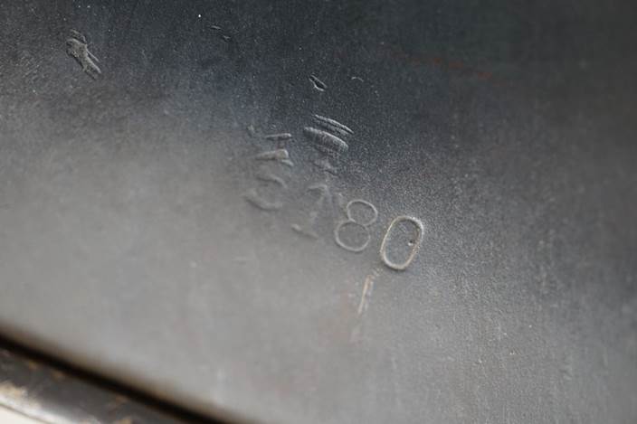 A close-up of a metal surface

Description automatically generated
