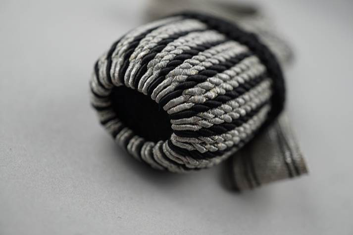 A close-up of a rope

Description automatically generated