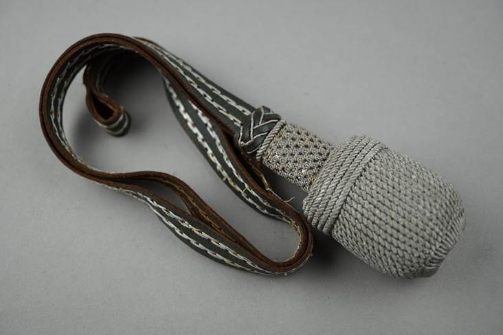 A close-up of a strap

Description automatically generated