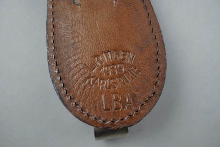 Close-up of a leather case

Description automatically generated