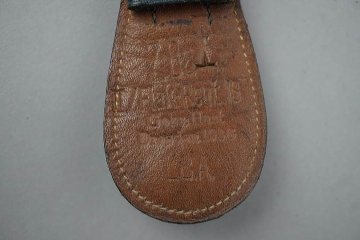 Close-up of a leather strap

Description automatically generated