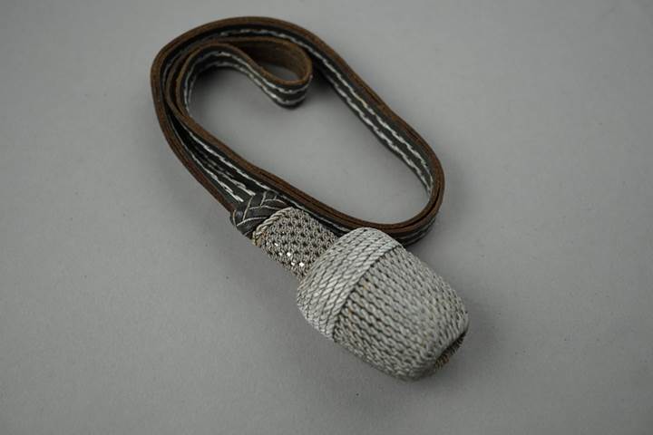 A close-up of a strap

Description automatically generated