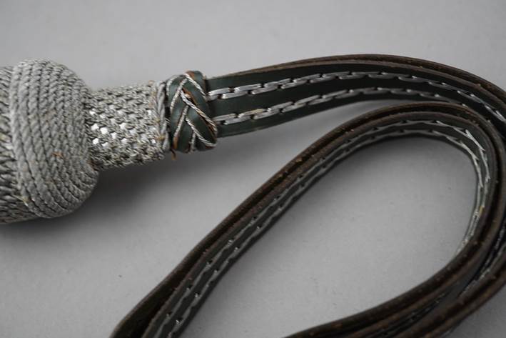 Close-up of a leather strap

Description automatically generated