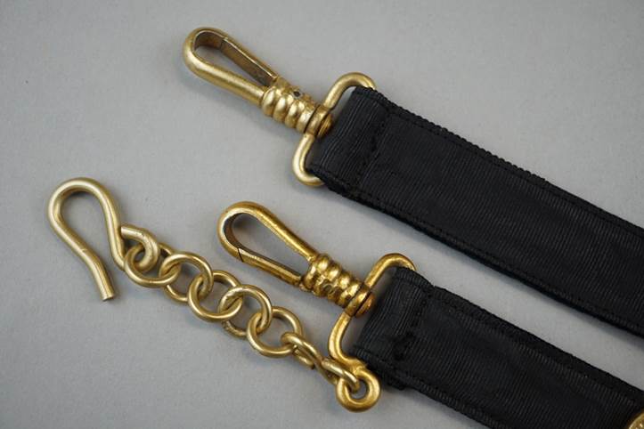 A close-up of a black strap

Description automatically generated