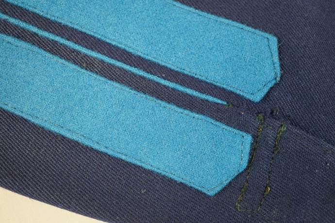 Close-up of a blue and black fabric

Description automatically generated