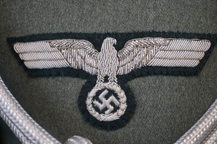 A close-up of a military uniform

Description automatically generated