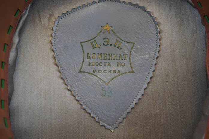 A close-up of a leather patch

Description automatically generated