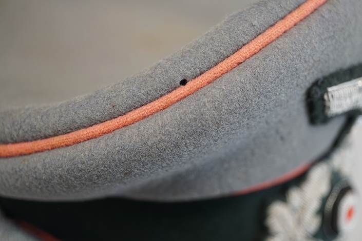 A close-up of a hat

Description automatically generated