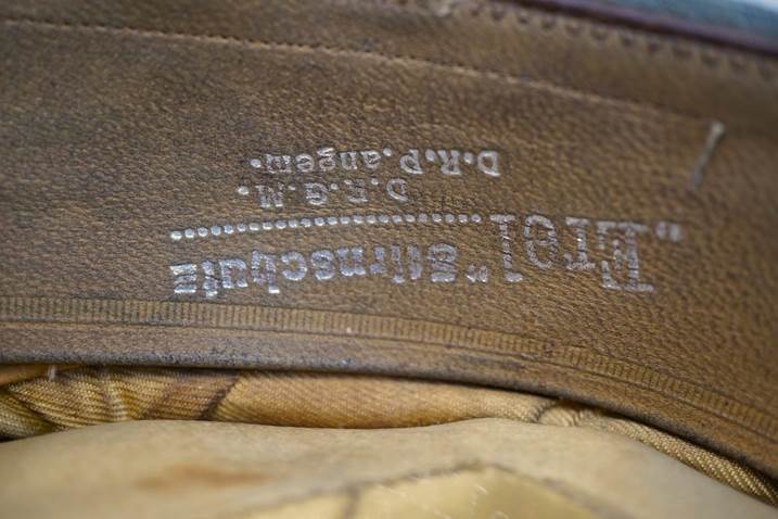 Close-up of a leather boot

Description automatically generated