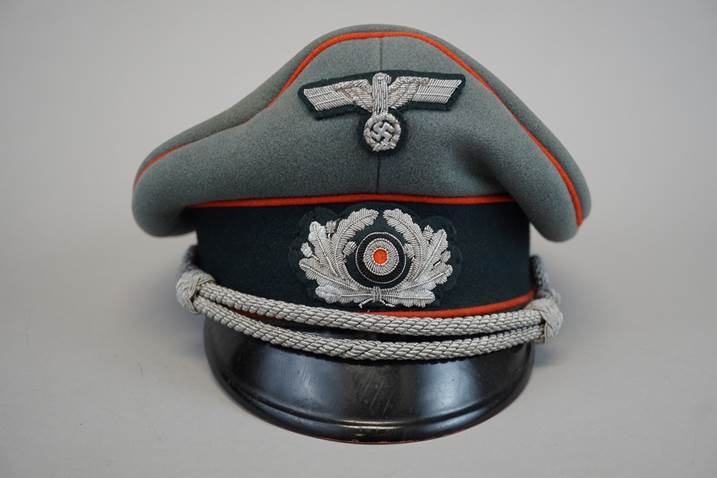 A grey hat with a red stripe

Description automatically generated