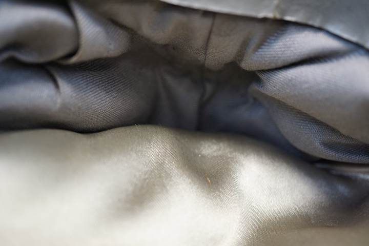 Close-up of a grey fabric

Description automatically generated