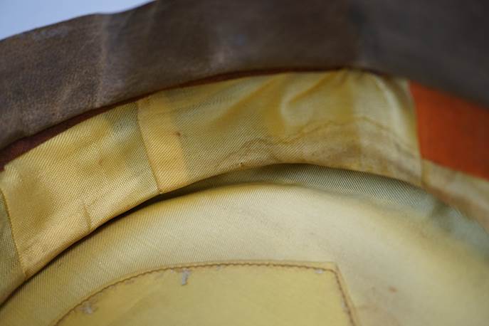 A close-up of a yellow fabric

Description automatically generated