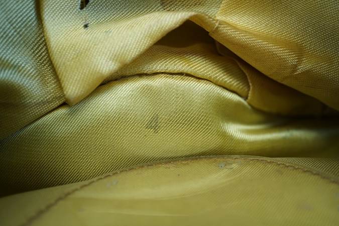 A close-up of a yellow fabric

Description automatically generated